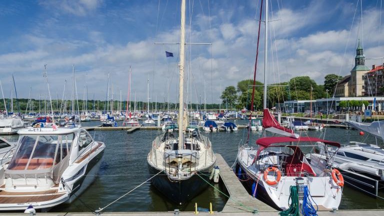 MARINA - Yachts moored to the quay of the port in Kamien Pomorski shutterstock_1120983911.jpg