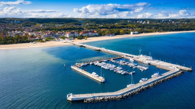 shutterstock_1831838539 Aerial view of the Baltic sea coastline and wooden pier in Sopot, Poland.jpg